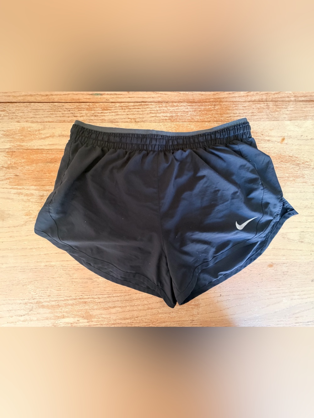 Nike woman’s Black Athletic Shorts with Reflective Swoosh